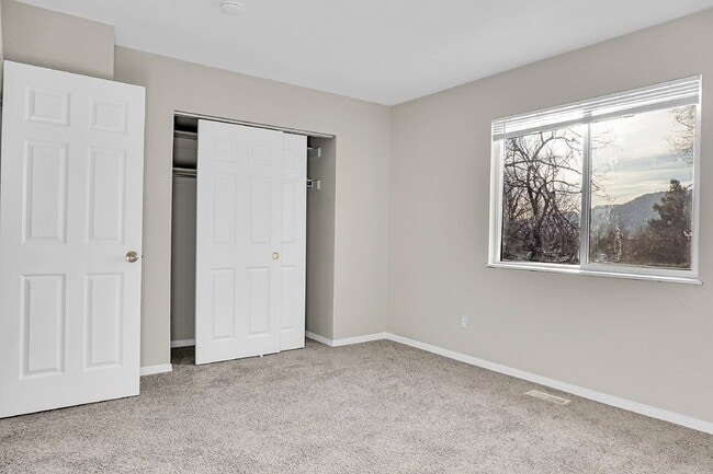 Building Photo - $1,745.95 -  2 Bed, 2 Bath Townhome in CO Springs with In Unit Laundry and Attached Garage!