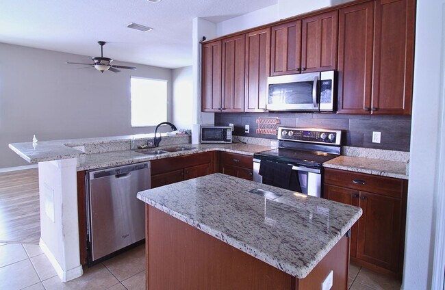 Building Photo - SPACIOUS 4-BED, 3-BATH HOME WITH PRIVATE BACKYARD PARADISE IN RIVERVIEW, FL