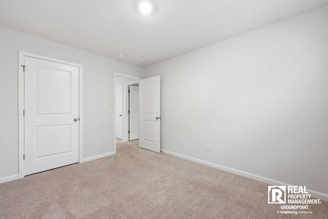 Building Photo - 4 Bedroom Rental in Cane Bay Plantation with Open Layout and Pond View