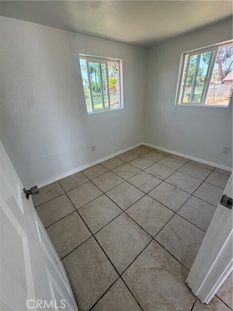 Building Photo - 690 N Perris Blvd