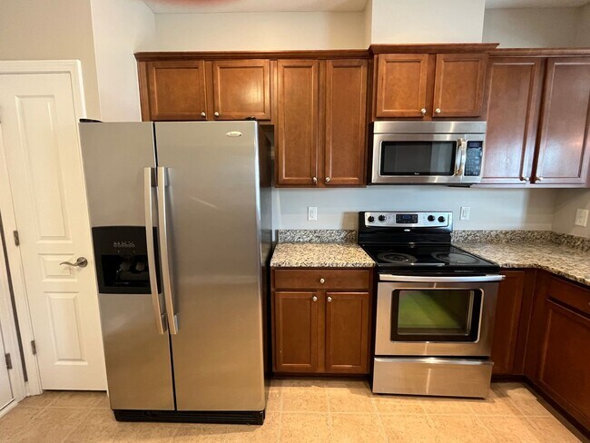 Building Photo - **OFFERING REFUNDABLE APPLICATION FEES** Fantastic 3BD, 2.5BA North Raleigh Townhome with Fenced ...