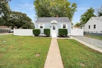Building Photo - Well-Maintained Home with Spacious Yard and Screened Porch