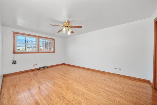 Building Photo - 5096 S Archer Ave