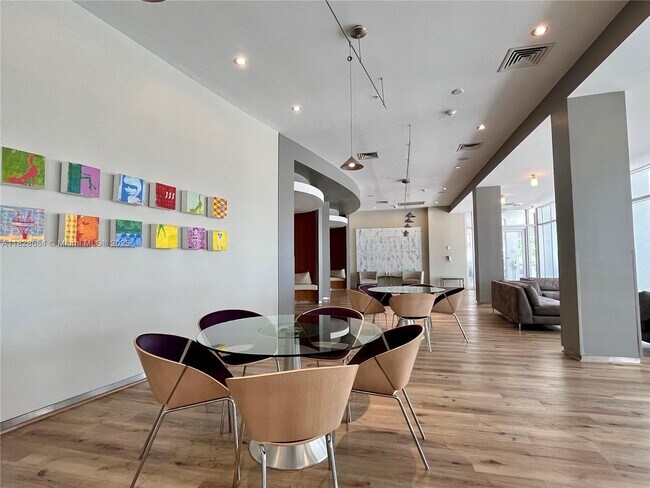 Building Photo - 10275 Collins Ave