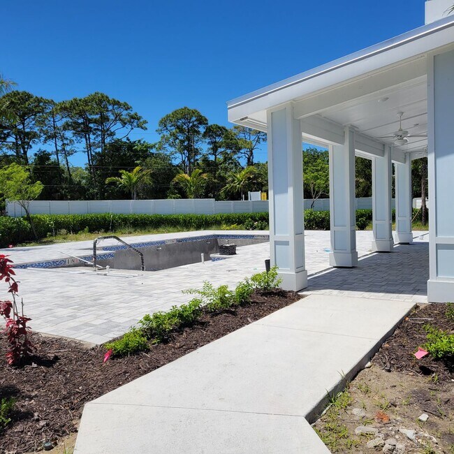 Building Photo - Annual UNfurnished almost BRAND NEW townho...