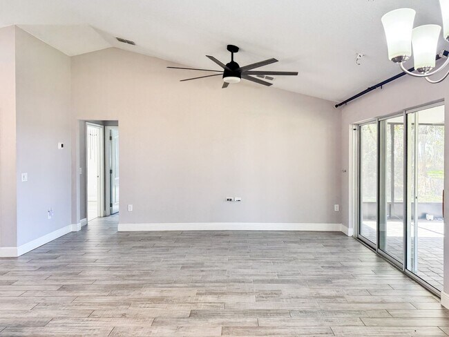 Building Photo - LAKE FRONT BRAND NEW Beautiful 3 bedroom on Lake Toho!