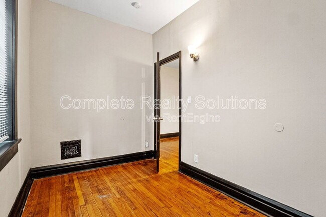 Building Photo - 3001 S Compton Ave