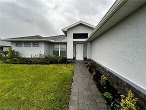 Building Photo - Available mid July! 4 Bed 2 Bath in NW Cape Coral!