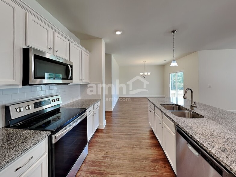 Building Photo - 7068 Creeksong Dr