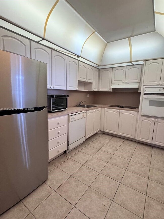 Building Photo - 19380 Collins Ave