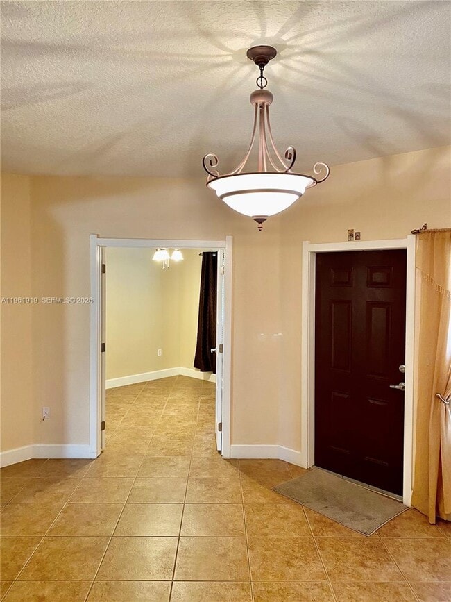 Building Photo - 11115 W Okeechobee Rd