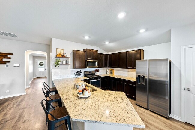 Building Photo - Charming Modern Home with Premium Amenitie...