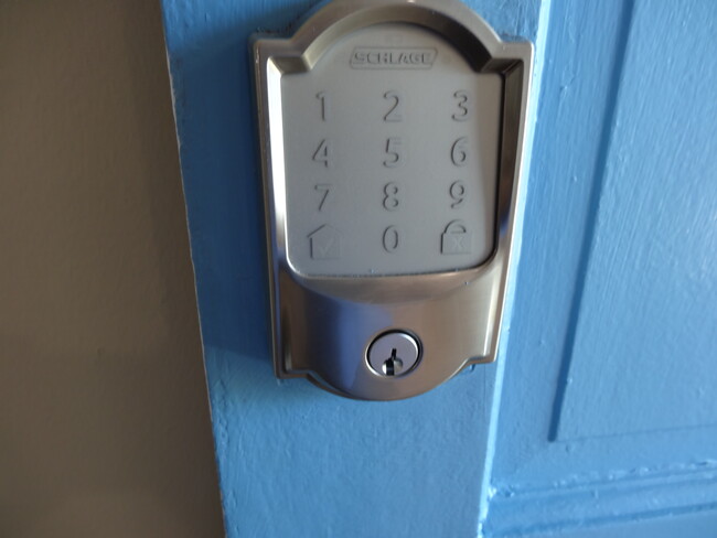 Electronic door lock - 9715 Harrell Ave