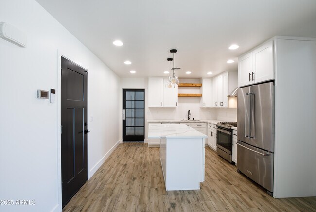 Building Photo - 4427 E Turney Ave