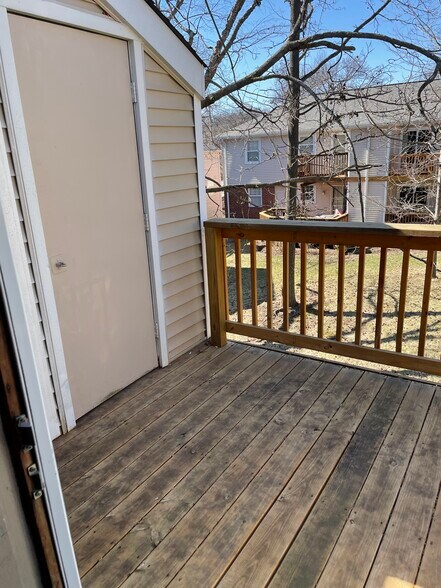 Deck with storage unit - 9053 Wrenwood Ln