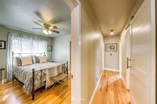 Bedroom 1 & Hallway - 412 NE Max William Loop