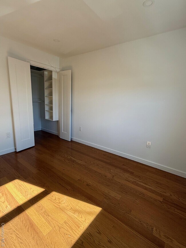 Building Photo - 215-15 17th Ave