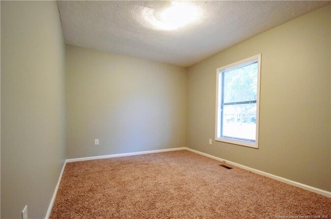 Building Photo - 6933 Woodmark Dr