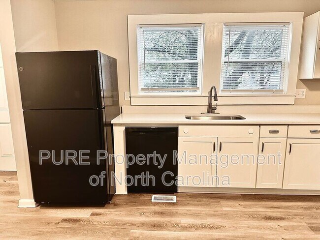 Building Photo - 411 W 10th St