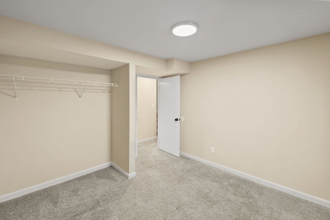 Building Photo - Spacious Split-Level Home with Finished Basement, Deck, Fenced Yard & 2-Car Garage