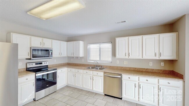 Building Photo - 8139 Deodora Cedar Ln