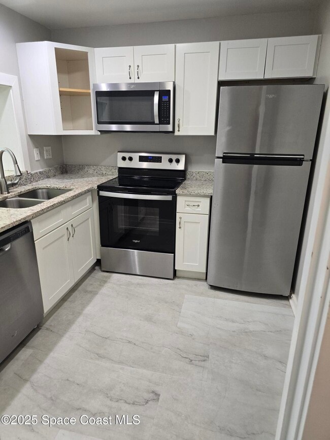 Building Photo - 1365 N Courtenay Pkwy