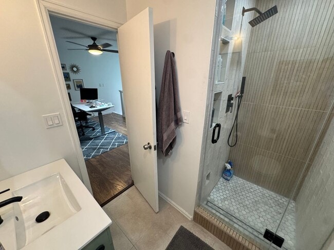 Building Photo - Bright 2BR Townhome with 3 Balconies & Private Patio