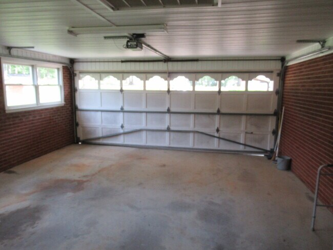 Building Photo - Charming All-Brick Ranch with Finished Bas...