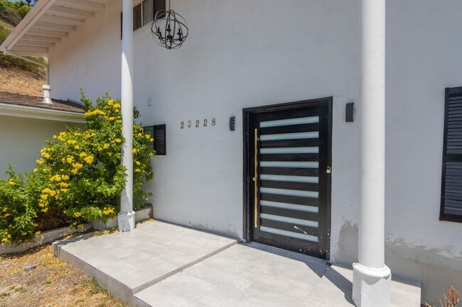 Building Photo - 5-Bedroom, 3-Bathroom Home with Solar Pane...