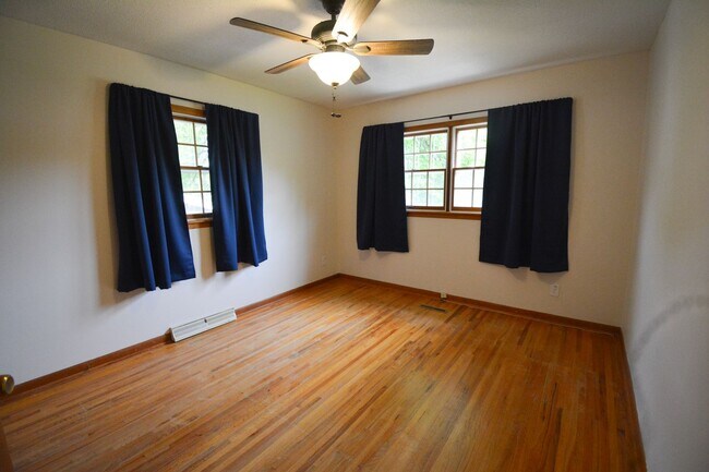 Building Photo - Beautiful multi-level with Gorgeous Yard and LOTS of Storage!