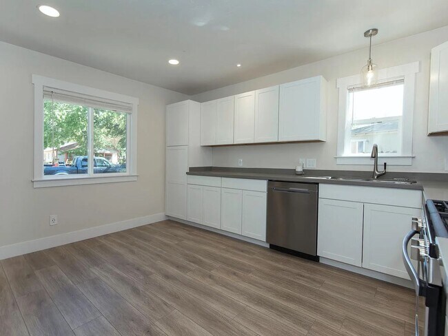 Building Photo - Updated Two bedroom with Large Fenced Yard