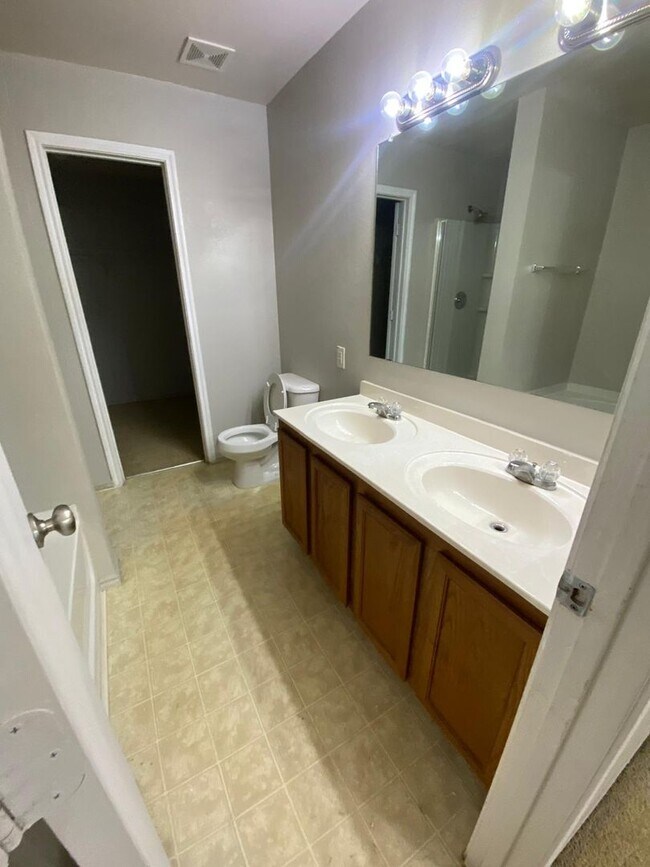Building Photo - Formal Living and Dining on both sides of ...