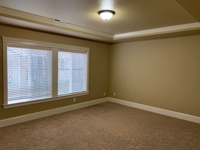 Building Photo - COMING SOON! GORGEOUS Townhome...  LOCATION , LOCATION near Peace Health Hospital