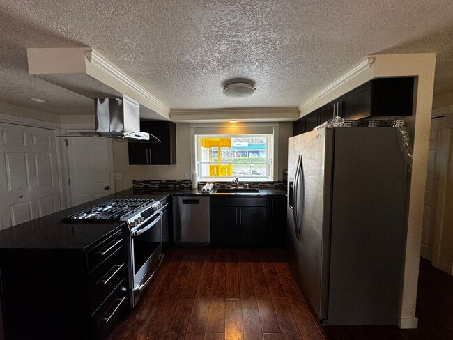 Building Photo - Charming 3 Bedroom Home with Beautiful Backyard & RV Parking