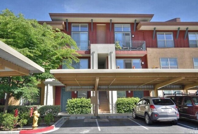 Building Photo - Modern 2BR/2.5BA Condo with Ensuite Bathro...