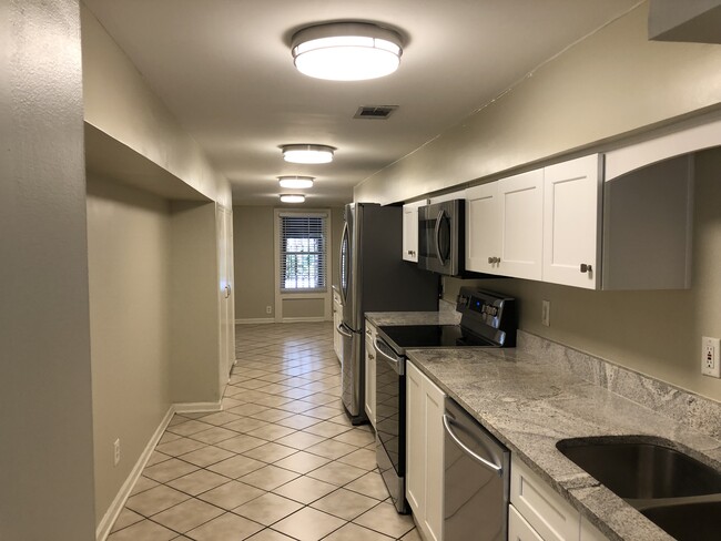 Garden Kitchen with Dining Area in background - 20 E Macon St