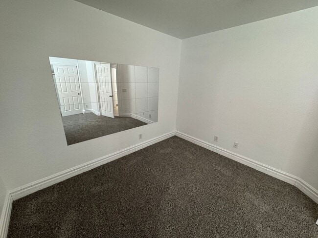Building Photo - STUNNING 2 STORY HOME IN A GUARD GATED COM...