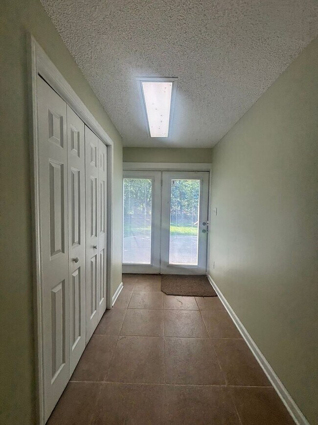 Building Photo - Fully Updated 2BR with Garage, Fenced Yard & Prime Johnson City Location
