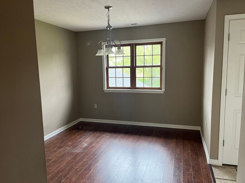 Dining area next to kitchen. - 114 N Third St
