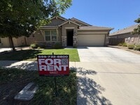Building Photo - Lovely SE Tulare available now!