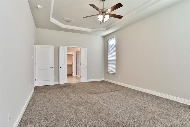 Trayed cieling in Primary bedroom - 253 Gill Point Ln