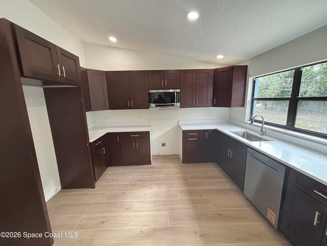 Building Photo - 6335 S Tropical Trail