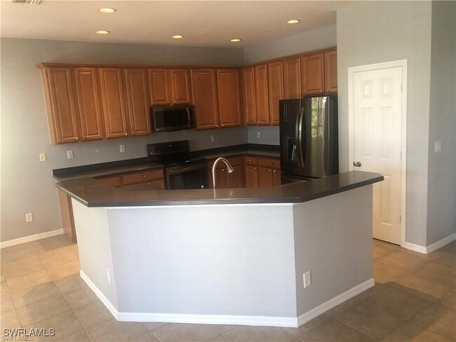 Building Photo - 9530 Gladiolus Blossom Ct