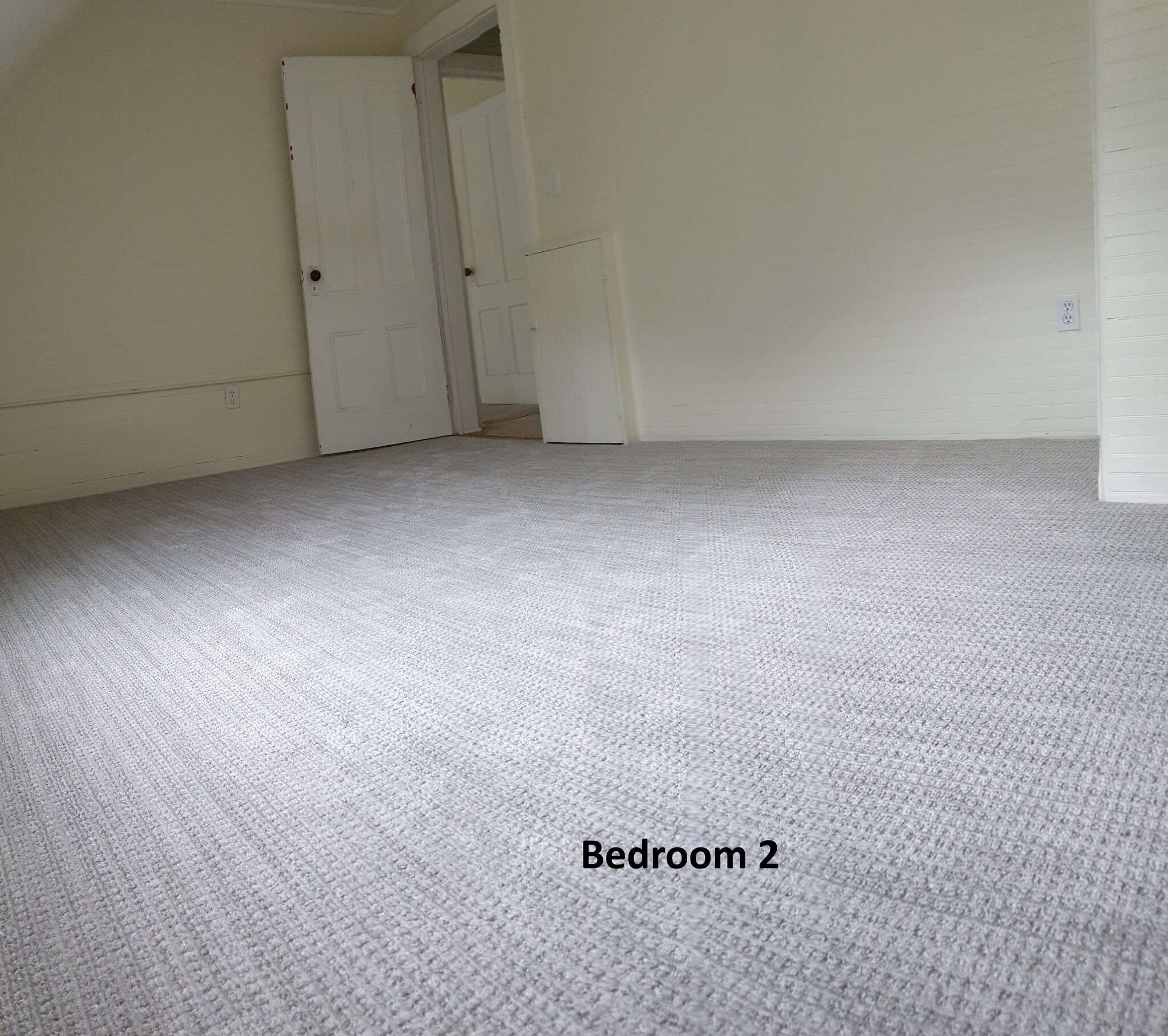 Bright and versatile, this second bedroom features ample closet space and a cozy layout - 412 Morris Ave