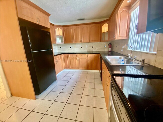 Building Photo - 3024 N 73rd Ter