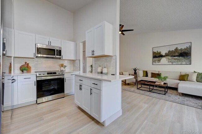 Building Photo - 12028 E Harvard Ave