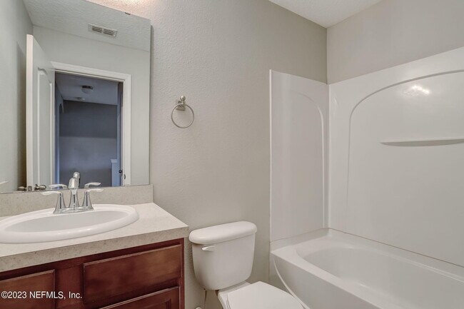 Building Photo - 4220 Plantation Oaks Blvd
