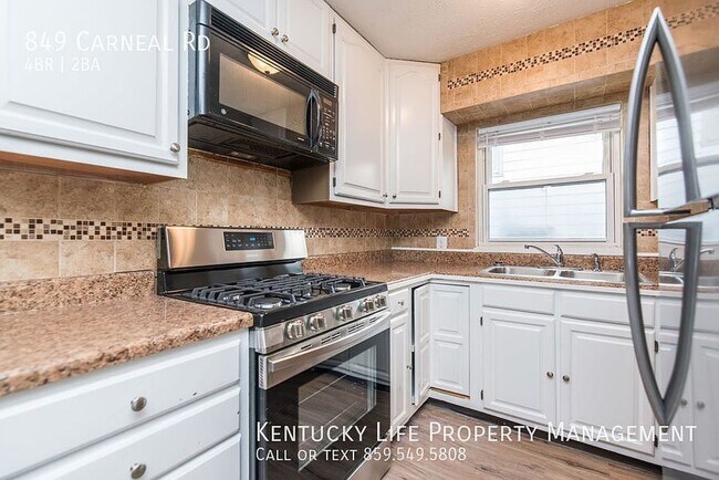 Building Photo - Spacious 4-Bedroom, 2-Bath Home with Garage, Side Parking & Private Backyard