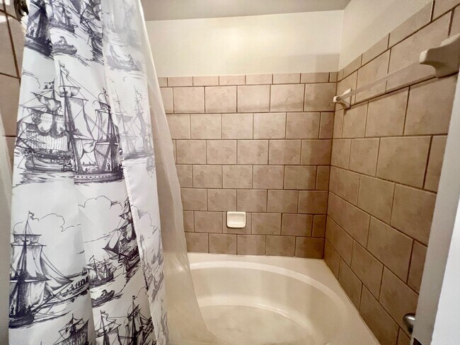 Building Photo - Available April 15th 2BD/2BA Condo on Granby! Gated Garage Parking with 2 Reserved Spots!! Balcony!