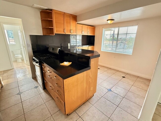 Building Photo - COMING SOON! Spacious 4 Bedroom, 3 Bathroom Home with Driveway
